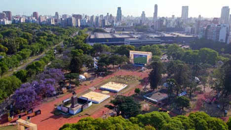 Dolly-in-aerial-view-of-a-World-Cup-soccer-match-at-the-Intendente-Seeber-square-in-Palermo,-Buenos-Aires,-Argentina