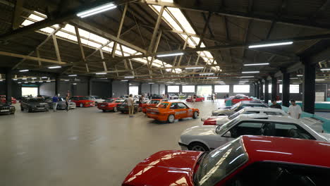 BMW-e30-classic-cars-fan-meeting-parked-inside-huge-Barcelona-warehouse-venue