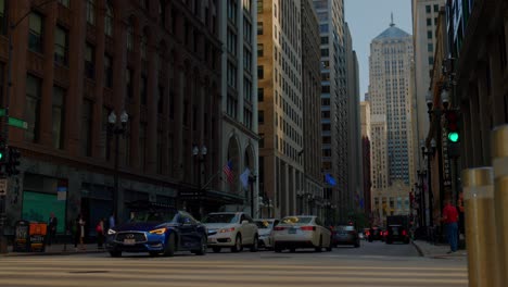 Cars-travel-through-an-intersection-in-downtown-Chicago