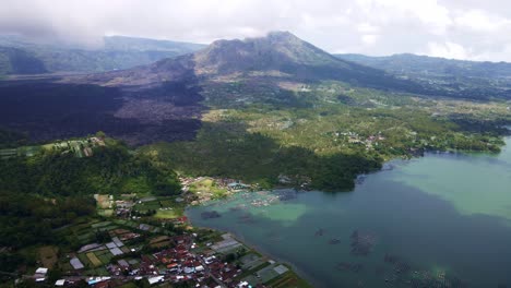 Panoramic-View-Of-Mount-Batur-Volcano-And-The-Rural-Town-In-Bali,-Indonesia