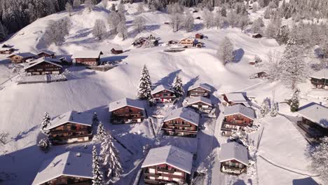 pushing-in-towards-snowy-Chalets-in-picturesque-Swiss-mountain-village-Grindelwald