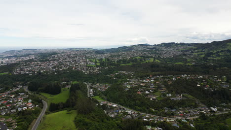Aerial-view-on-suburbs-of-Dunedin-city-in-South-Island,-New-Zealand