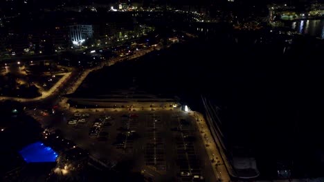 Aerial-View-of-Piraeus-City-at-Night,-Athens-Metropolitan-Area,-Greece,-Street-Lights-and-Buildings