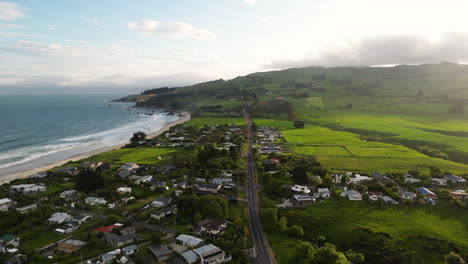 Karitane-coastline,-Huriawa-Historic-Site,-small-village-near-Dunedin-Otago-South-Island-New-Zealand,-aerial