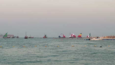 boats-with-world-cup-countries'-flag-on-it-pass