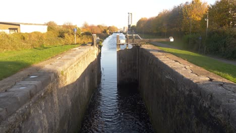 Tilt-up-Reveal-Of-The-Water-Sluice-Of-Dublin's-Grand-Canal-In-Ireland