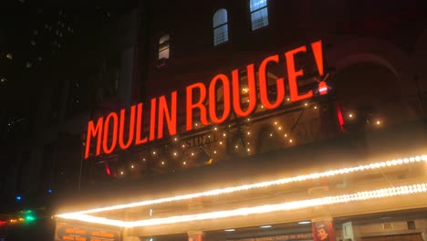 Neon-Sign-Of-Moulin-Rouge-Musical-Show-At-The-Entrance-On-Broadway-At-The-Al-Hirschfeld-Theatre-At-Night-In-New-York-City,-New-York