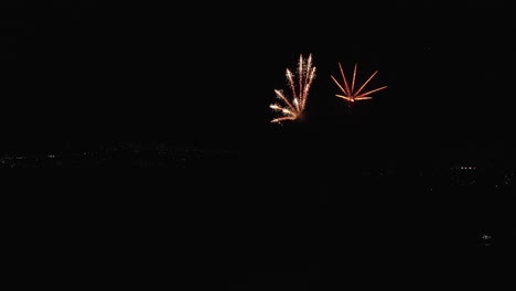 aerial-view-of-colourful-fireworks-in-the-night-sky---timelapse