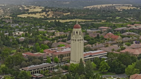 Stanford-City-California-Aerial-v2-cinematic-drone-fly-around-university-campus-area,-dynamic-zoom-in-close-to-renowned-landmark-hoover-tower-observation-platform---Shot-with-Mavic-3-Cine---June-2022
