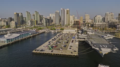 San-Diego-California-Aerial-v91-low-flyover-bay-capturing-historical-uss-midway-museum,-broadway-pier,-cruise-ship-terminal-and-waterfront-downtown-cityscape---Shot-with-Mavic-3-Cine---September-2022