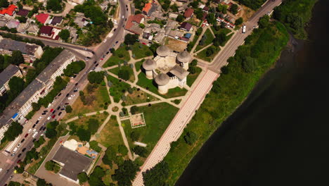 Aerial-drone-view-of-the-medieval-Soroca-Fortress,-next-to-Dniester-river,-Moldova