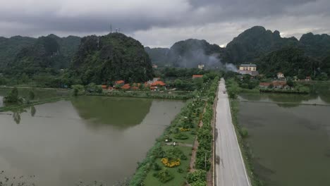 Beautiful-aerial-drone-shot-of-Vietnamese-nature-with-mountains-and-lakes