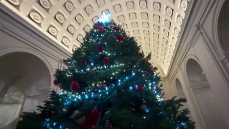 Slow-Parallax-Shot-Around-Large-Festive-Christmas-Inside-Pasadena-City-Hall