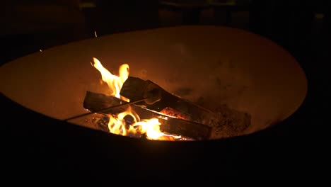 Marshmallow-roasting-in-on-open-flame-at-campfire,-close-up