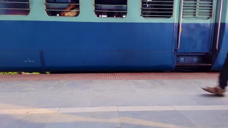indian-passenger-express-train-crossing-station-on-track-at-evening-from-flat-angle-video-is-taken-at-kamakhya-railway-station-assam-india-on-May-22-2022
