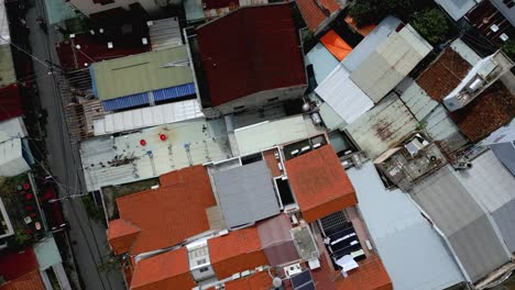 Spinning-aerial-shot-of-tightly-packed-buildings-in-Hoi-An,-Vietnam