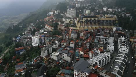 Tilting-aerial-shot-of-the-city-of-Sapa-in-Vietnam