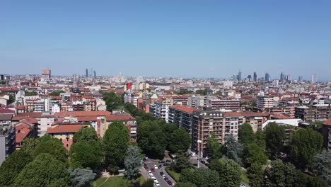 Colorful-rooftops-and-skyline-of-Milan-city,-aerial-view