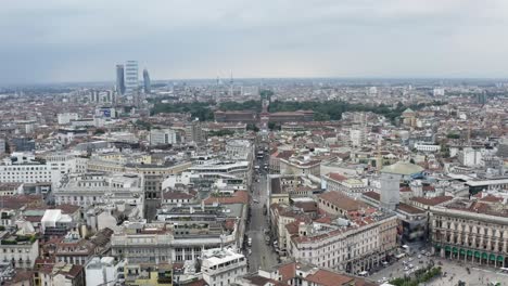 Majestic-cityscape-rooftops-of-Milan-city,-aerial-drone-view