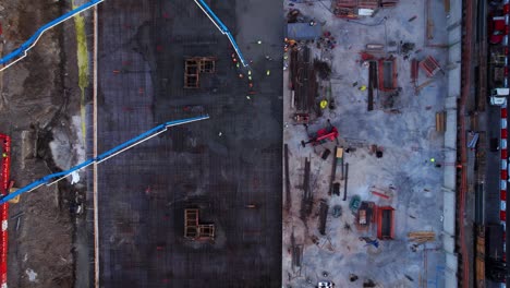 Aerial-view-above-a-urban-construction-site-in-middle-of-buildings-in-Brooklyn,-NY---cenital,-drone-shot