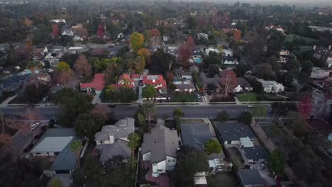 Aerial-view-flying-across-Pasadena-neighborhood-during-sunset-in-Los-Angles-California