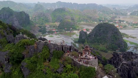 Aerial-Orbiting-over-limestone-mountains-of-Hang-Mua-Caves-in-Ninh-Binh