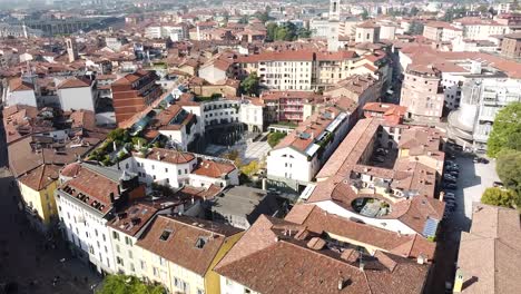 Panoramic-view-of-Bergamo-city-rooftops,-aerial-drone-fly