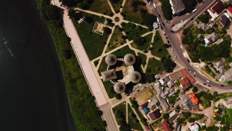 Rotating-aerial-top-view-of-the-historc-Soroca-Fortress,-on-the-riverside-of-Dniester-river,-Moldova