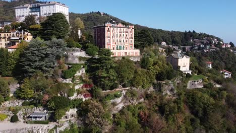 Iconic-buildings-of-Brunate-town-in-Italy,-aerial-drone-view