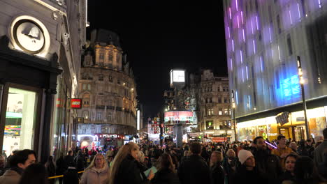Piccadilly-Circus-crowded-on-cold-night,-London.-Static