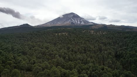 drone-shot-in-ascent-in-front-of-the-active-volcano-Popocatepetl-in-mexico