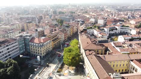 Vivid-cityscape-of-Bergamo-on-sunny-day,-aerial-fly-view