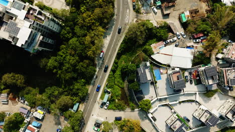 Toma-Superior-De-Drones-De-Carreteras-Concurridas-Y-Edificios-Altos-En-Hongkong,-China