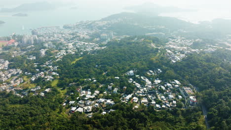 Drone-shot-view-of-crowded-housing-in-Hongkong-city,-China