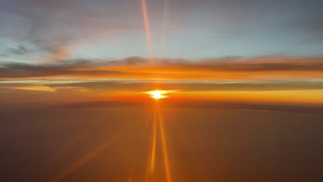 Incredible-sunset-over-the-Mediterranean-sea-from-a-jet-cockpit-flying-westbound-naer-Valencia’s-coast,-Spain