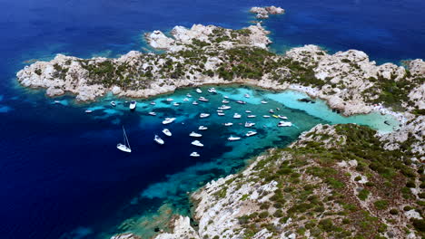 Aerial-Drone-View-over-Beautiful-Cala-at-Caprera-Island,-Sardinia,-Italy