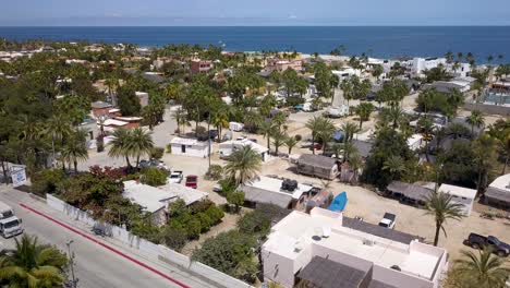 Mexico---Tropical-Baja-City-Townscape-in-Popular-Tourist-Spot,-Aerial-Drone-Establishing-View