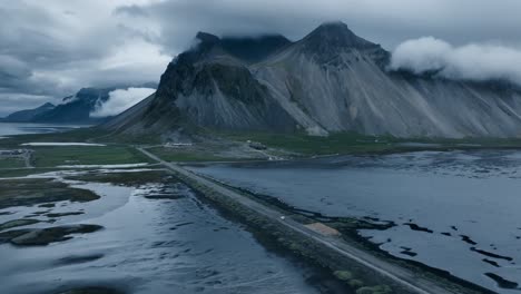 Aerial-drone-footage-of-driving-among-the-Icelandic-coast-on-a-moody-day