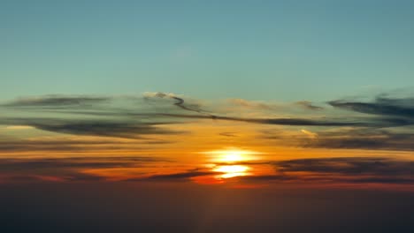 Spectacular-sunset-over-the-Mediterranean-Sea,-recorded-from-a-jet-cockpit-flying-westbound-at-11000-metres