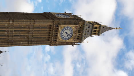 Vertical-Shot-Of-Iconic-Big-Ben-Against-Blue-Sky-With-Clouds-In-London,-England