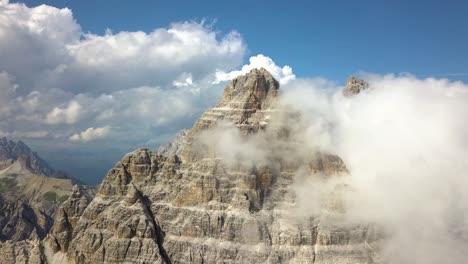 Beautiful-Aerial-of-Three-peaks-of-Tre-Cime-di-Lavaredo-Mountain-Top-Peaks-on-a-sunny-day-Belluno,-Dolomite,-Italy