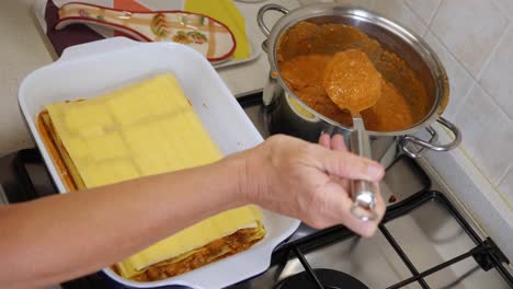 Preparing-Lasagna,-a-typical-Italian-Pasta-Course