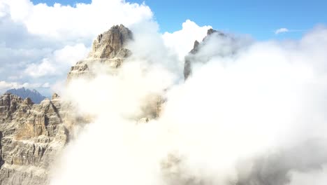 Aerial-of-the-Mountain-Tops-of-Three-peaks-at-National-Park-Tre-Cime-di-Lavaredo,-Belluno,-Dolomite,-Italy
