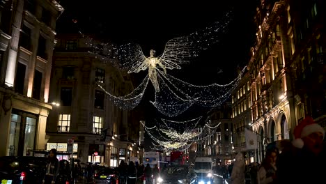 Driving-under-the-Christmas-lights-on-Regents-Street,-London,-United-Kingdom