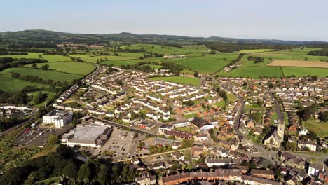 Denbighshire-residential-suburban-North-Wales-countryside-housing-estate-town-aerial-view-right-pan