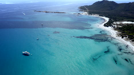 Aerial-Drone-View-over-La-Cinta-Beach,-San-Teodoro,-Emerald-Coast,-Sardinia,-Italy