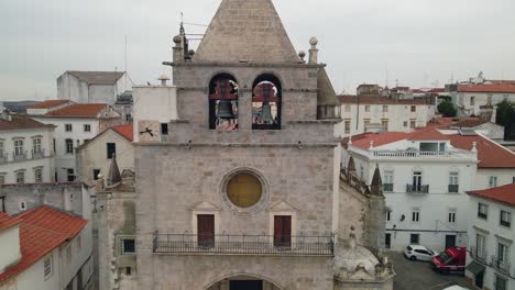 Aerial-view-of-church-bell-tower-on-an-old-town