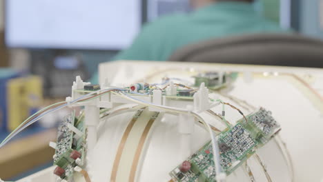 Close-up-slider-shot-of-intricate-circuitry-and-circuit-boards-in-a-piece-of-medical-equipment