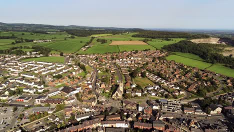 Denbighshire-residential-suburban-North-Wales-countryside-housing-estate-aerial-view-slow-right-pan-shot