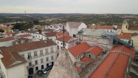 Aerial-view-of-church-rooftop-on-an-old-town